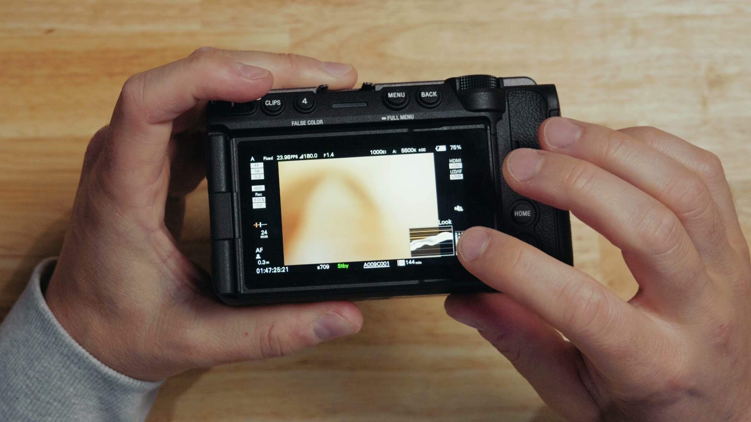Sony FX5 monitor view with a very small waveform and vectorscope pinned to the bottom right corner of the screen