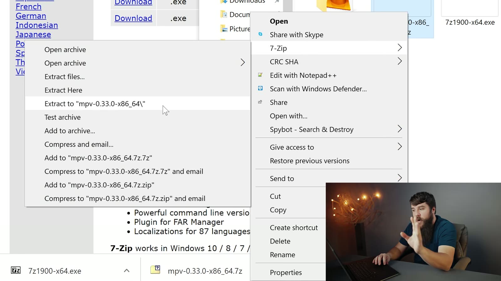 The 7-Zip extraction dialog unpacking the downloaded mpv archive