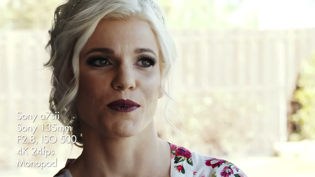 The bride in close-up with the on-screen overlay reading Sony a7sii, Sony 135mm, F2.8 ISO 500, 4K 24fps, Monopod