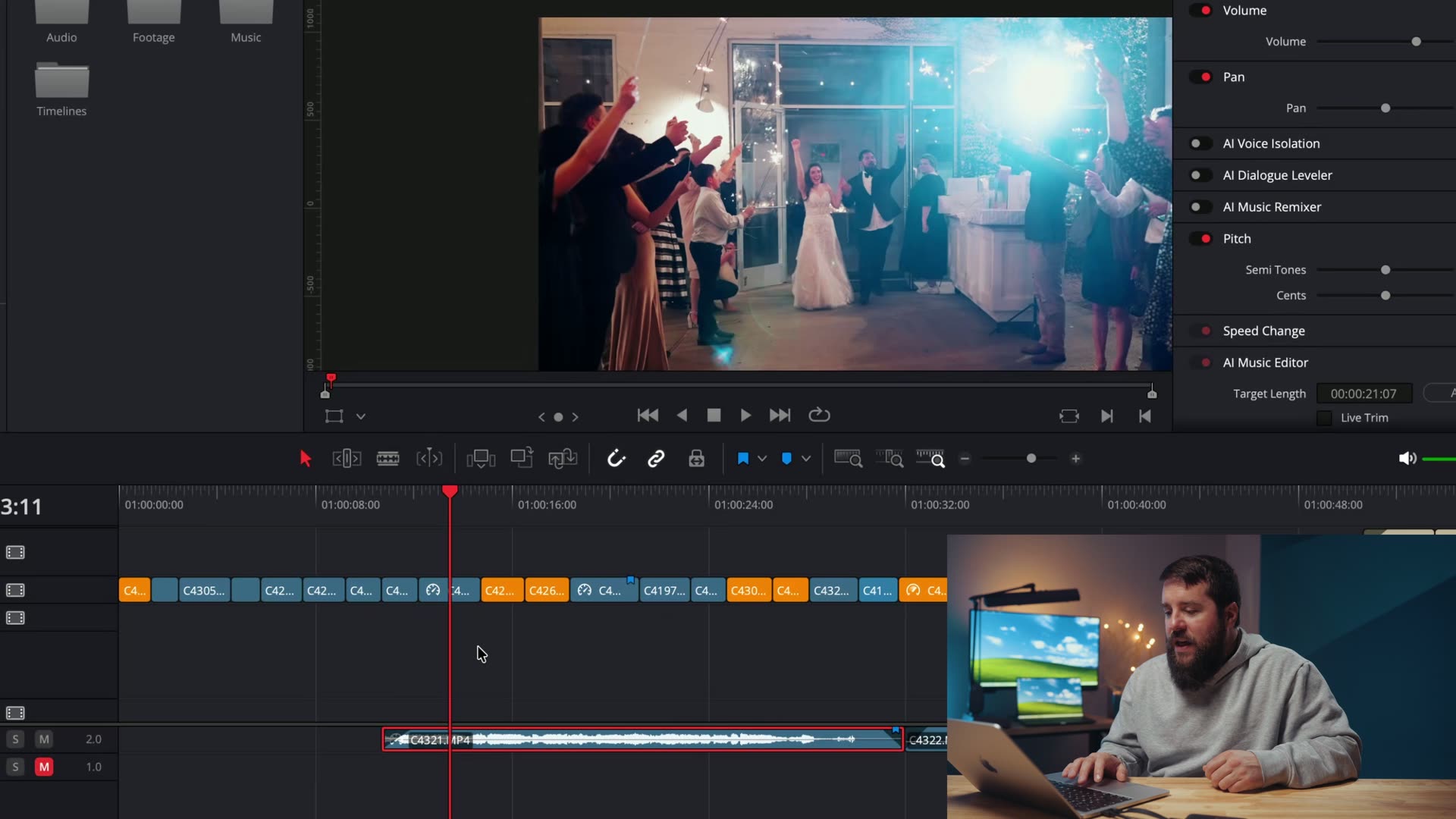An editing timeline showing a video clip of the couple's exit with its synced on-camera audio track unmuted underneath it