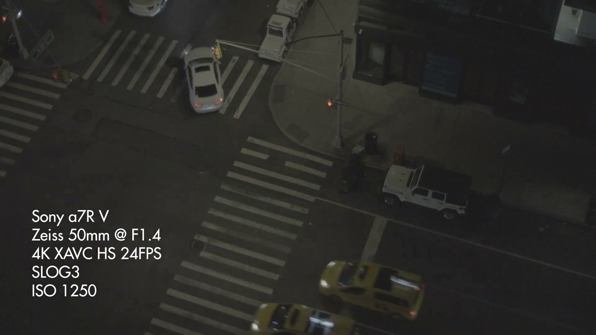 The same intersection at ISO 1250 with car headlights passing through