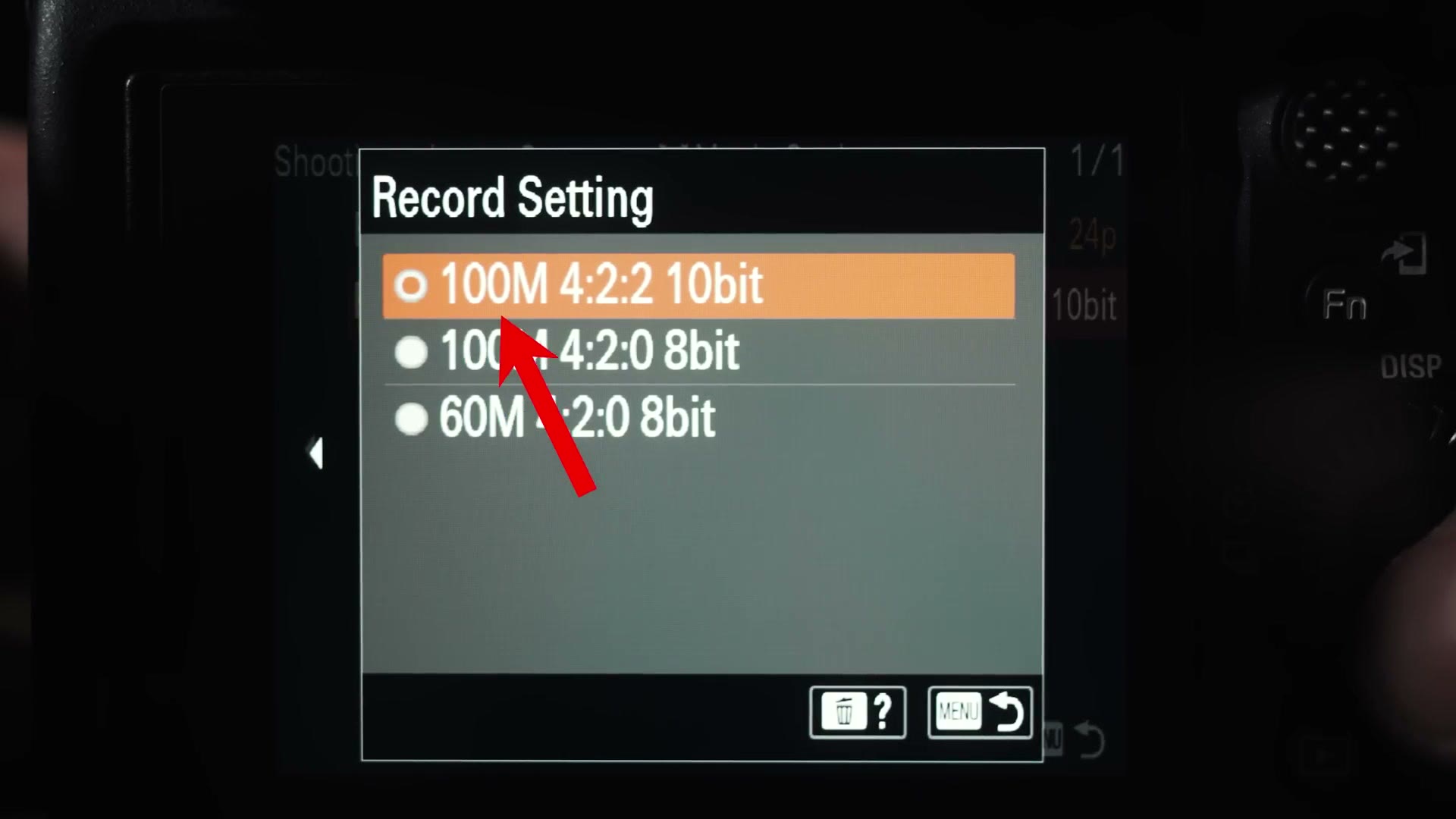 The XAVC S Record Setting menu with 100M 4:2:2 10bit selected and an arrow pointing at it.