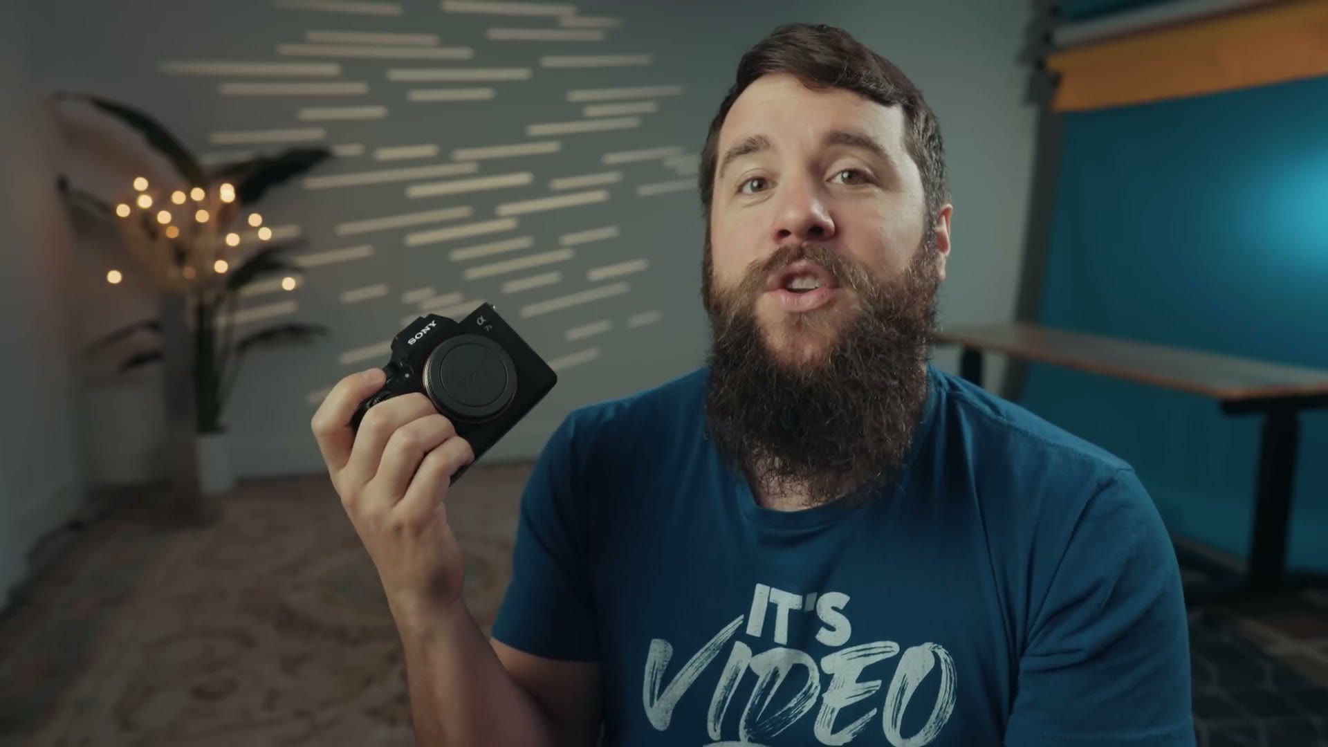 Matt Johnson holding a Sony a7S III camera