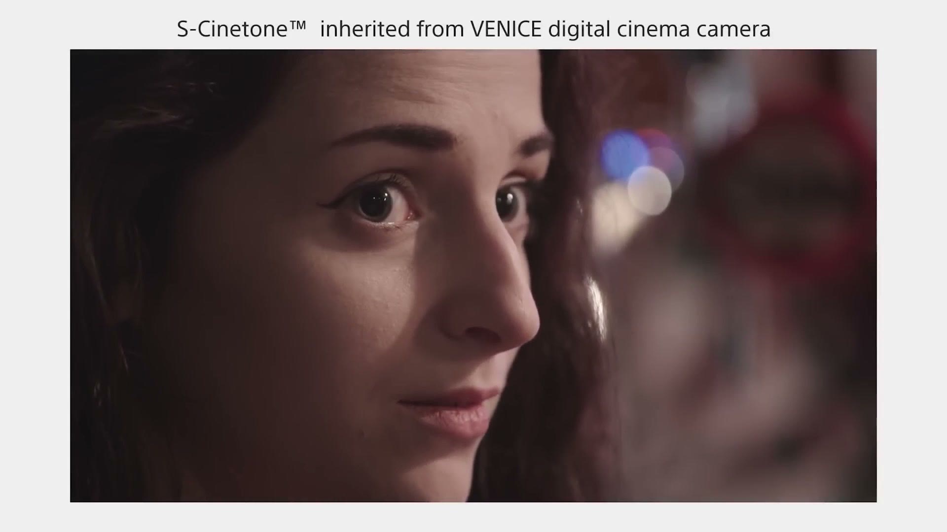 A close up of a woman's face graded in S-Cinetone, under a banner reading S-Cinetone inherited from VENICE digital cinema camera