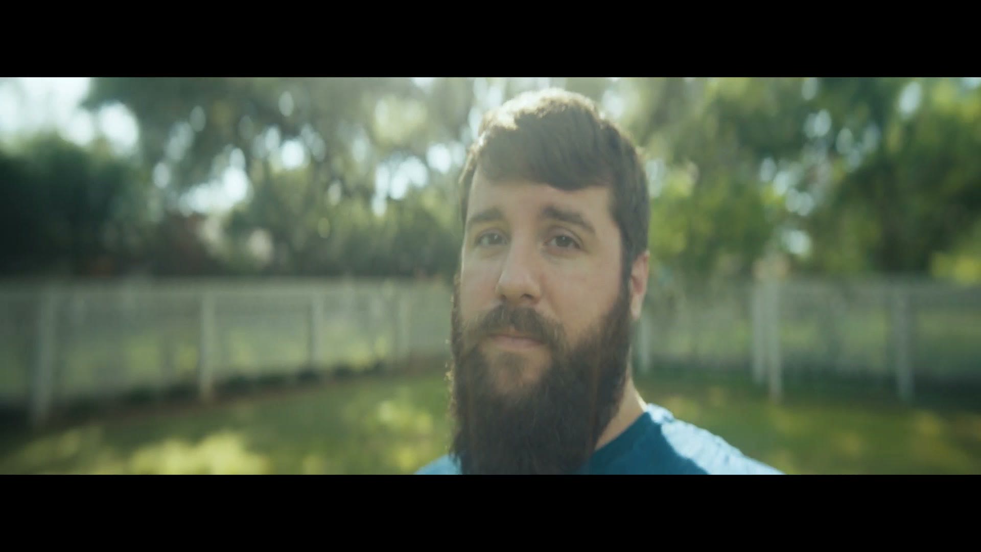 Close up talking head shot filmed in anamorphic with a diopter attached