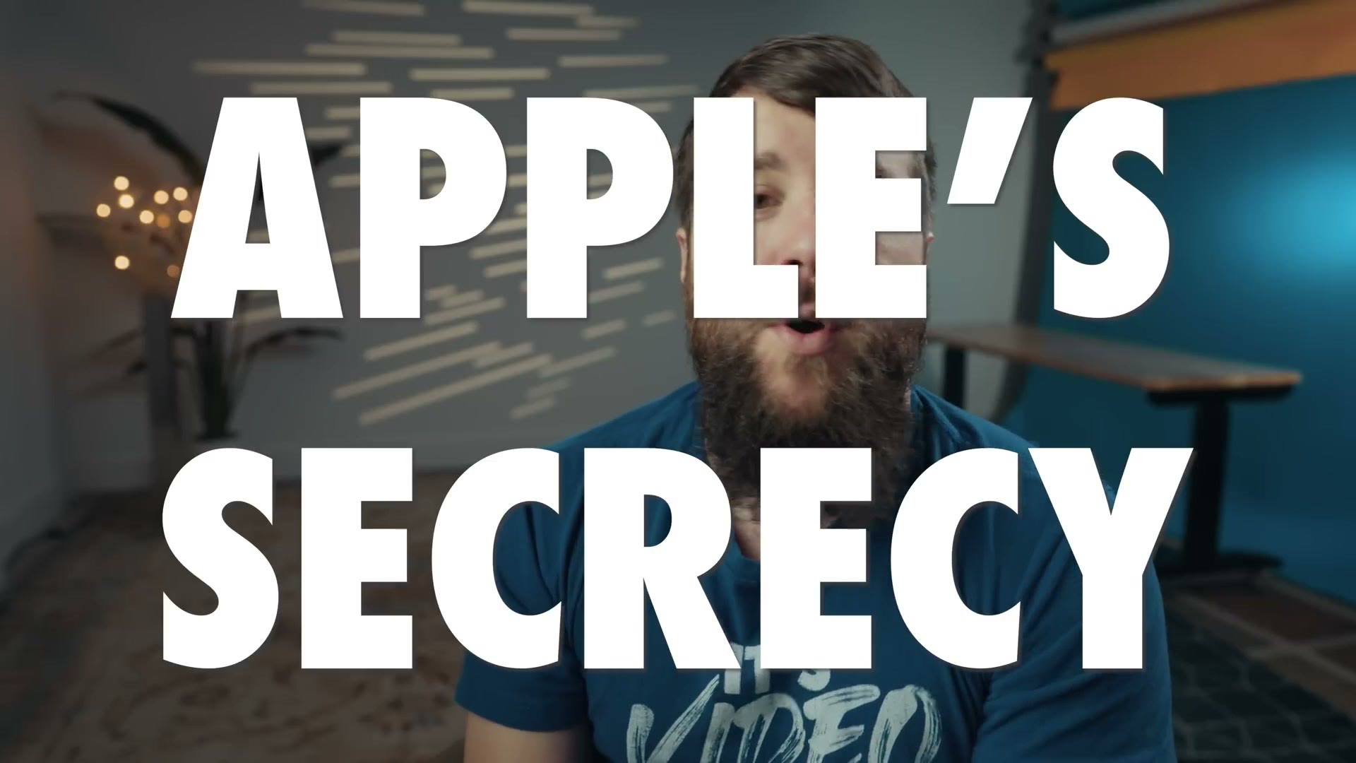 On screen title card reading Apple's Secrecy