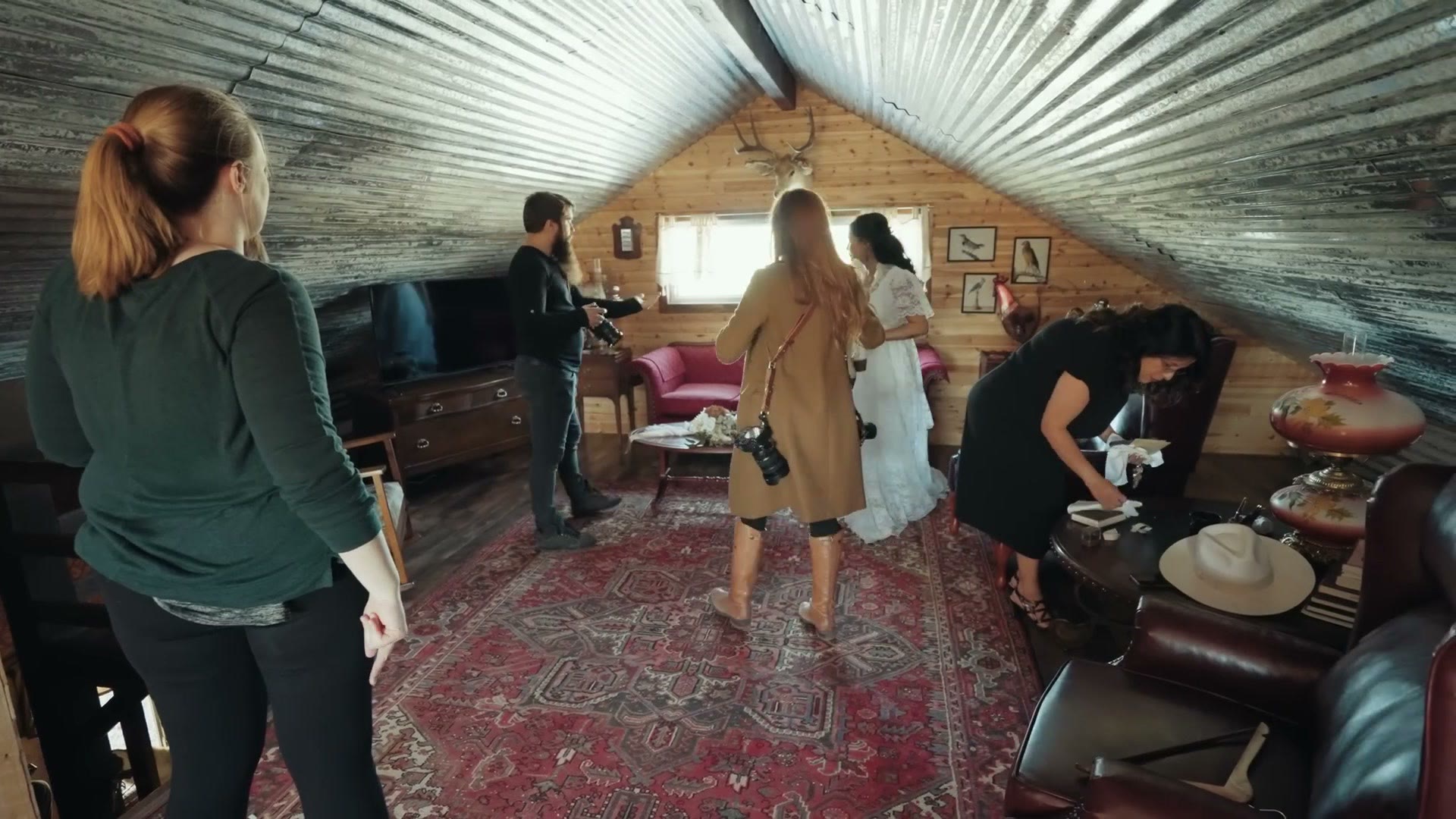 The bride getting ready in the barn