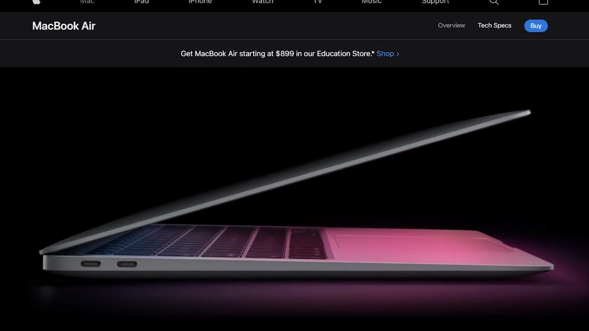 Apple's MacBook Air product page showing the laptop slightly open against a dark background