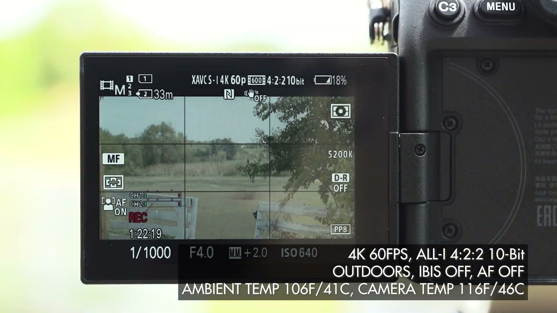 A camera LCD showing an overlay reading ambient temp 106F/41C and camera temp 116F/46C