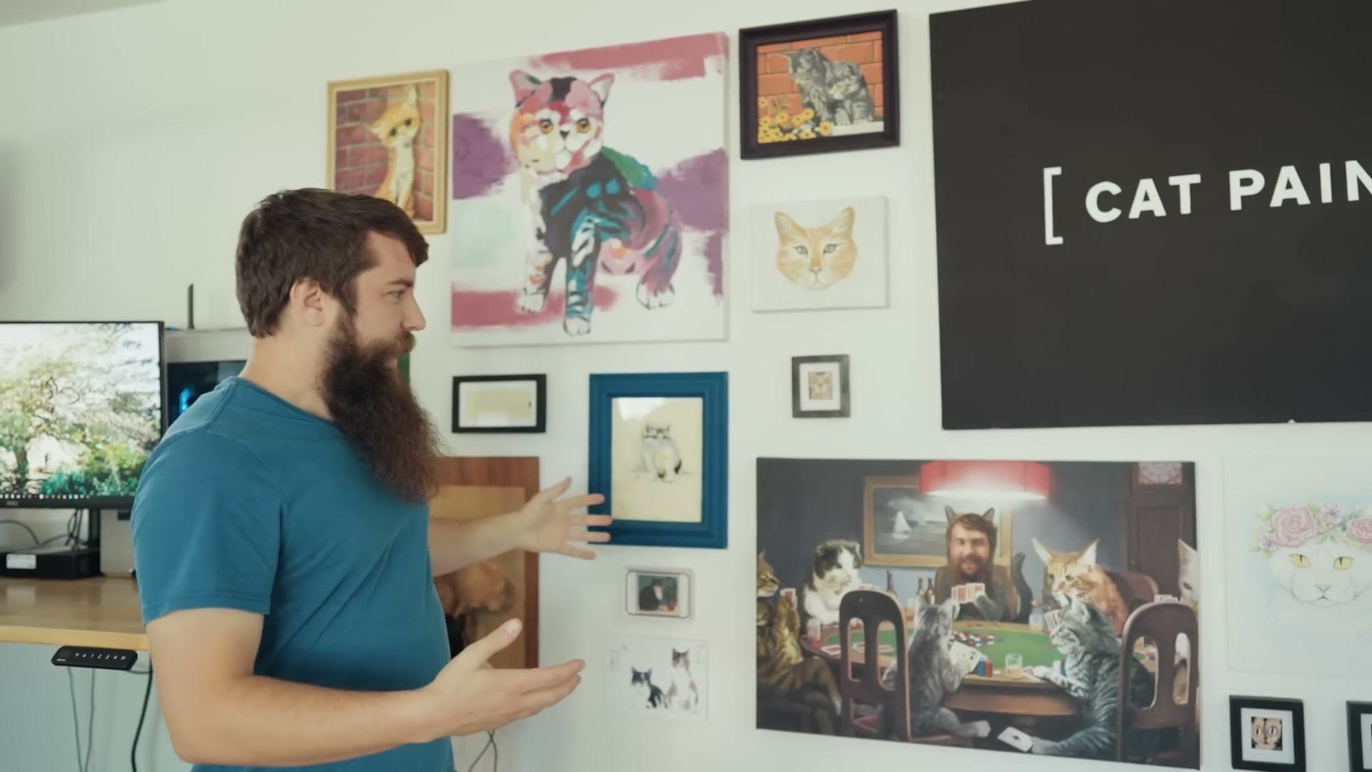 Close view of the collected cat paintings