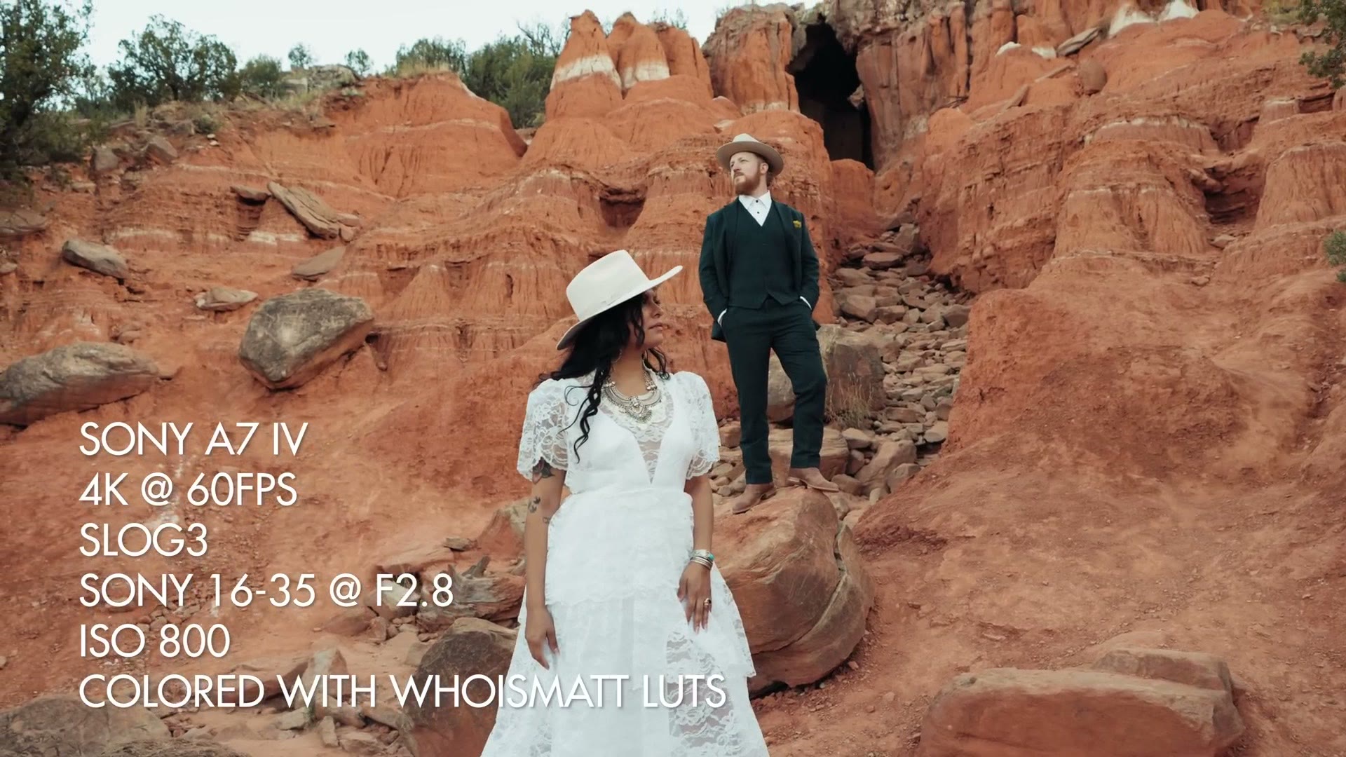 Couple among red rock formations