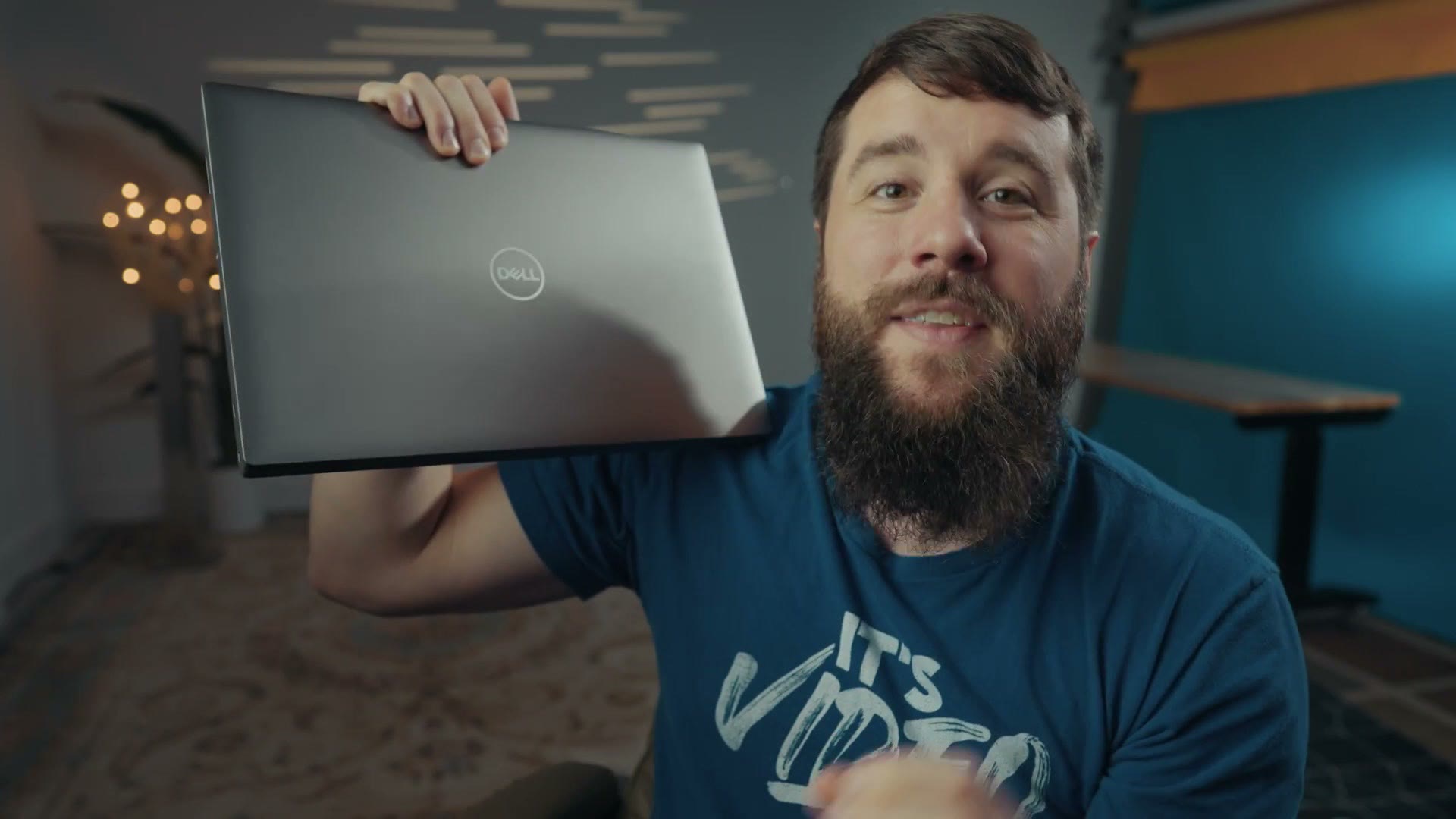 Matt Johnson holding the Dell Precision 5680 laptop