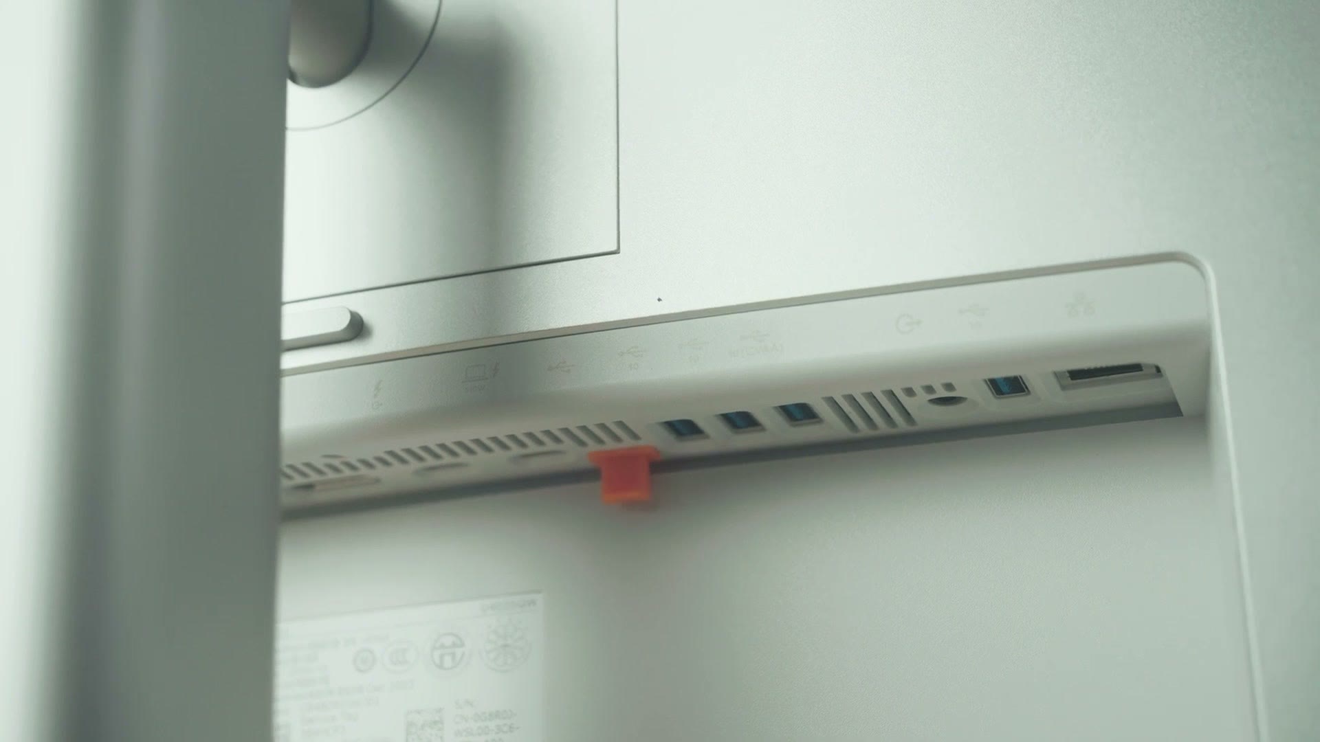 The rear input panel of the Dell U4025QW monitor