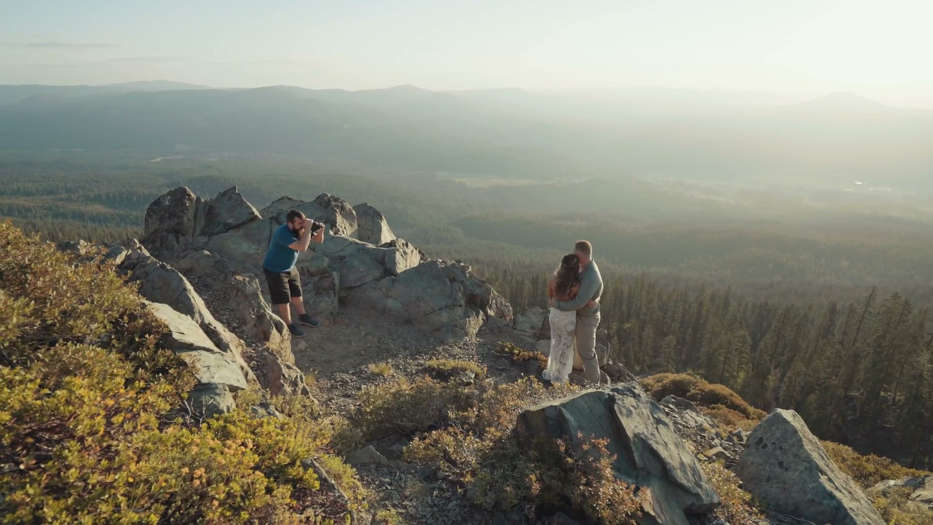 Digital footage of the same couple on a mountain