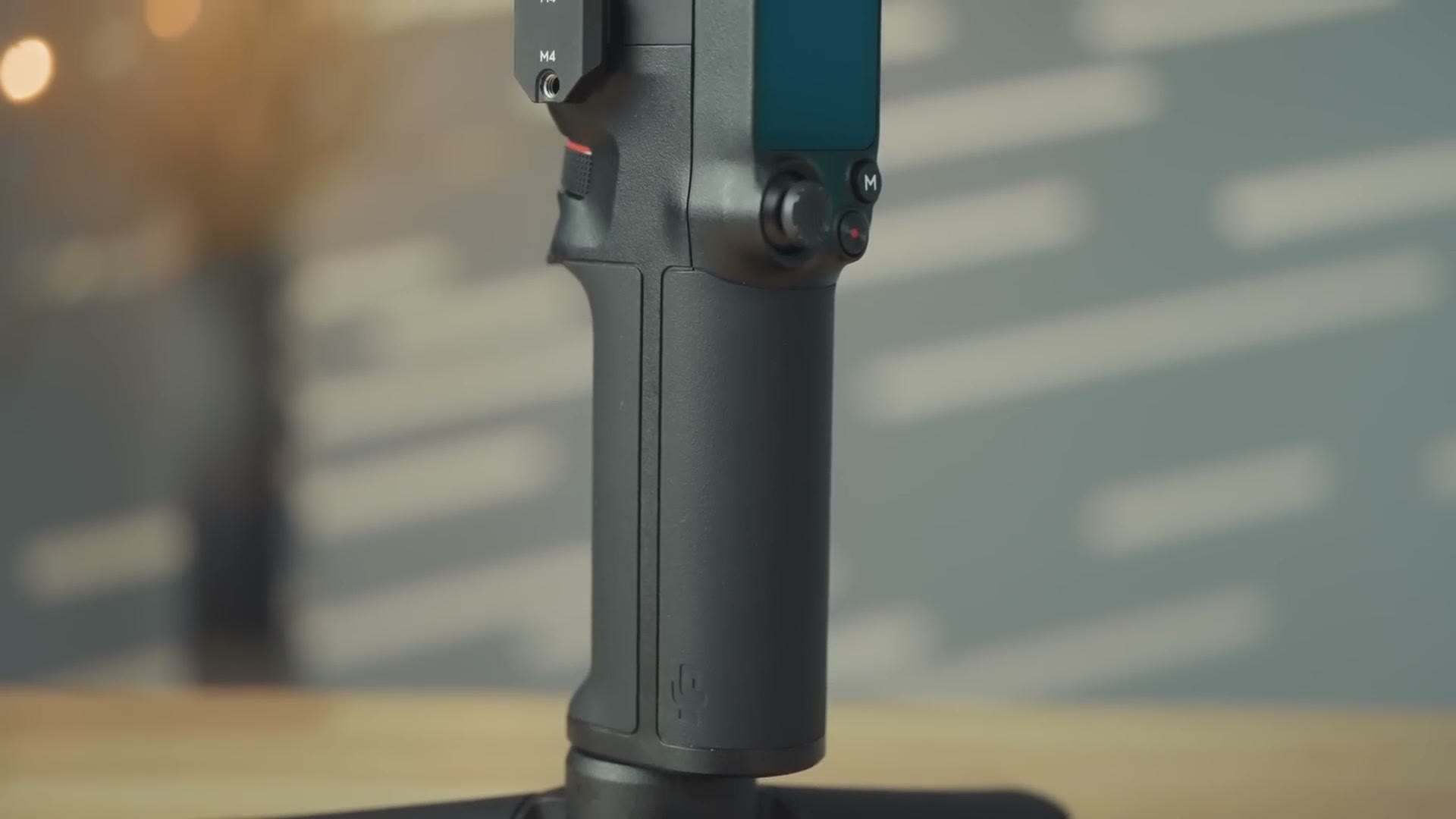 Close up of the DJI RS 3 Mini handle where the non swappable battery lives