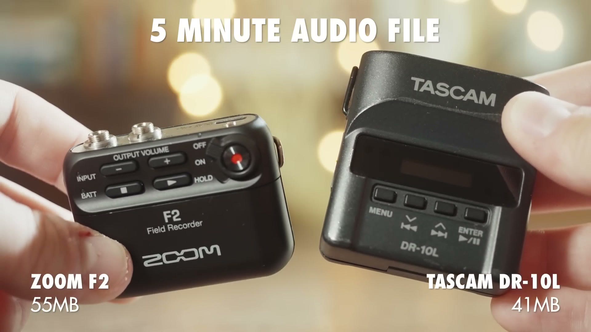 Both recorders held up side by side with the on-screen text 5 minute audio file, Zoom F2 55MB, Tascam DR-10L 41MB.