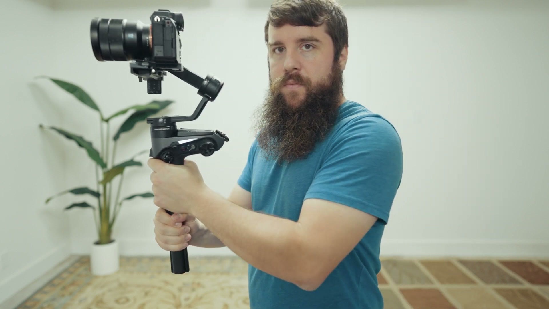 Elbows locked down at the sides while holding a gimbal