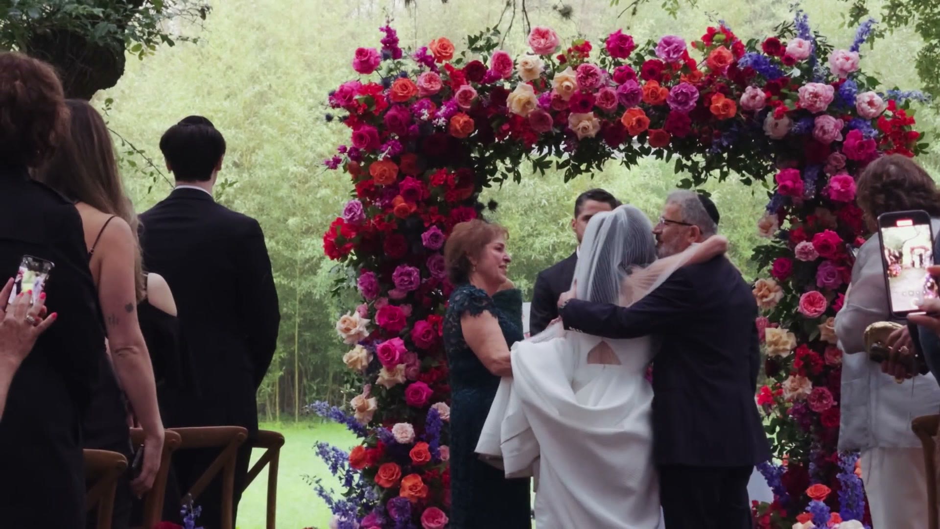 Matt filming the ceremony with the iPhone gimbal, with the resulting footage inset