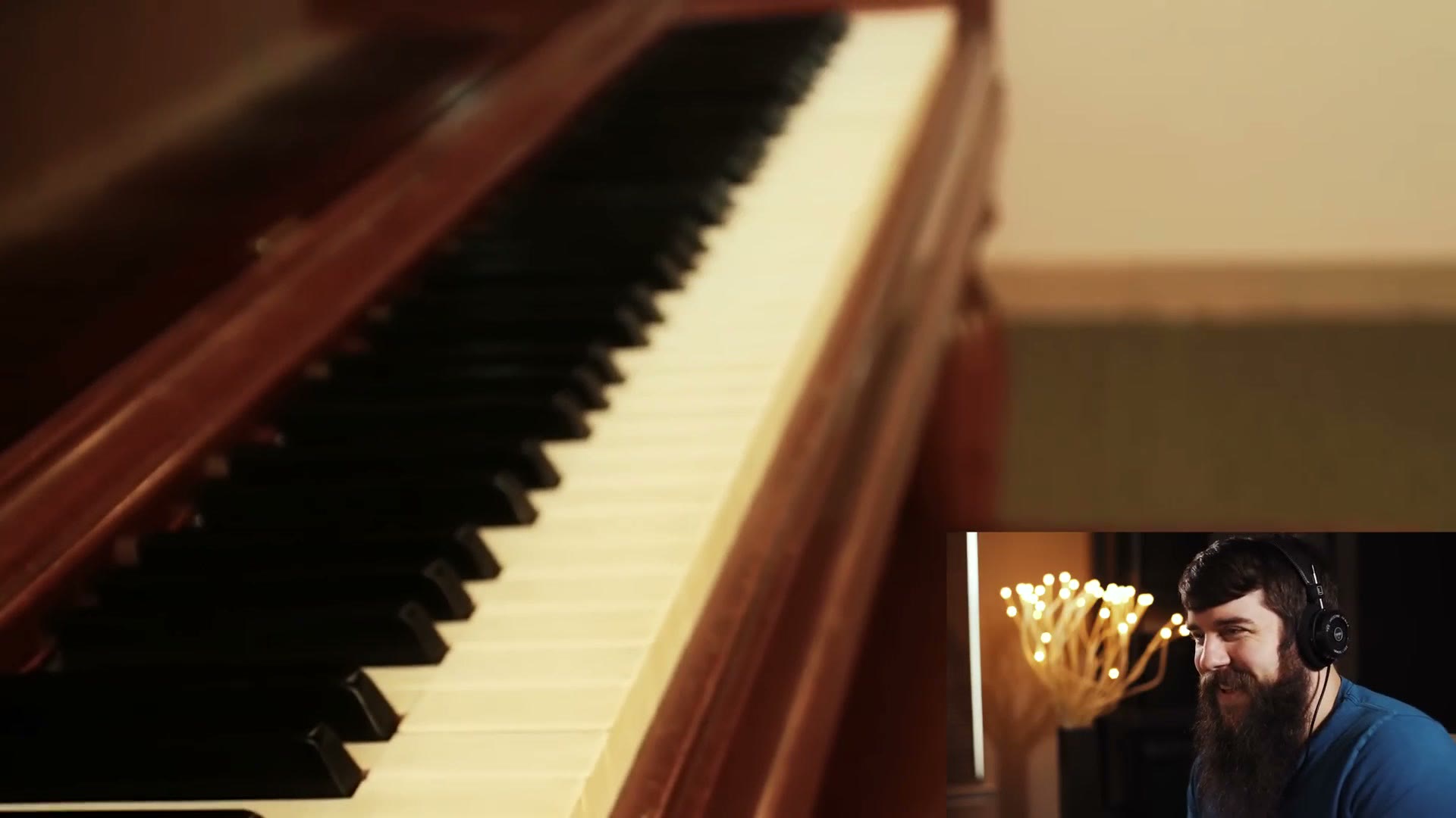 An extremely shallow close-up of piano keys running diagonally across the frame, almost entirely out of focus.