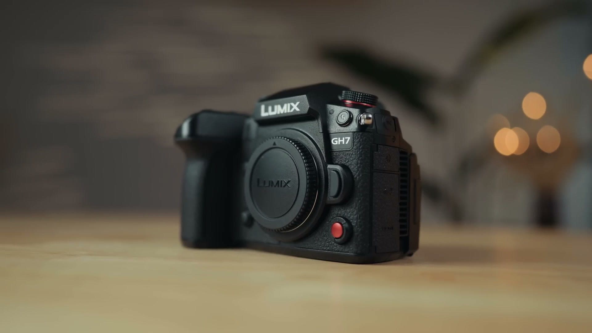 Panasonic Lumix GH7 camera body sitting on a wooden table