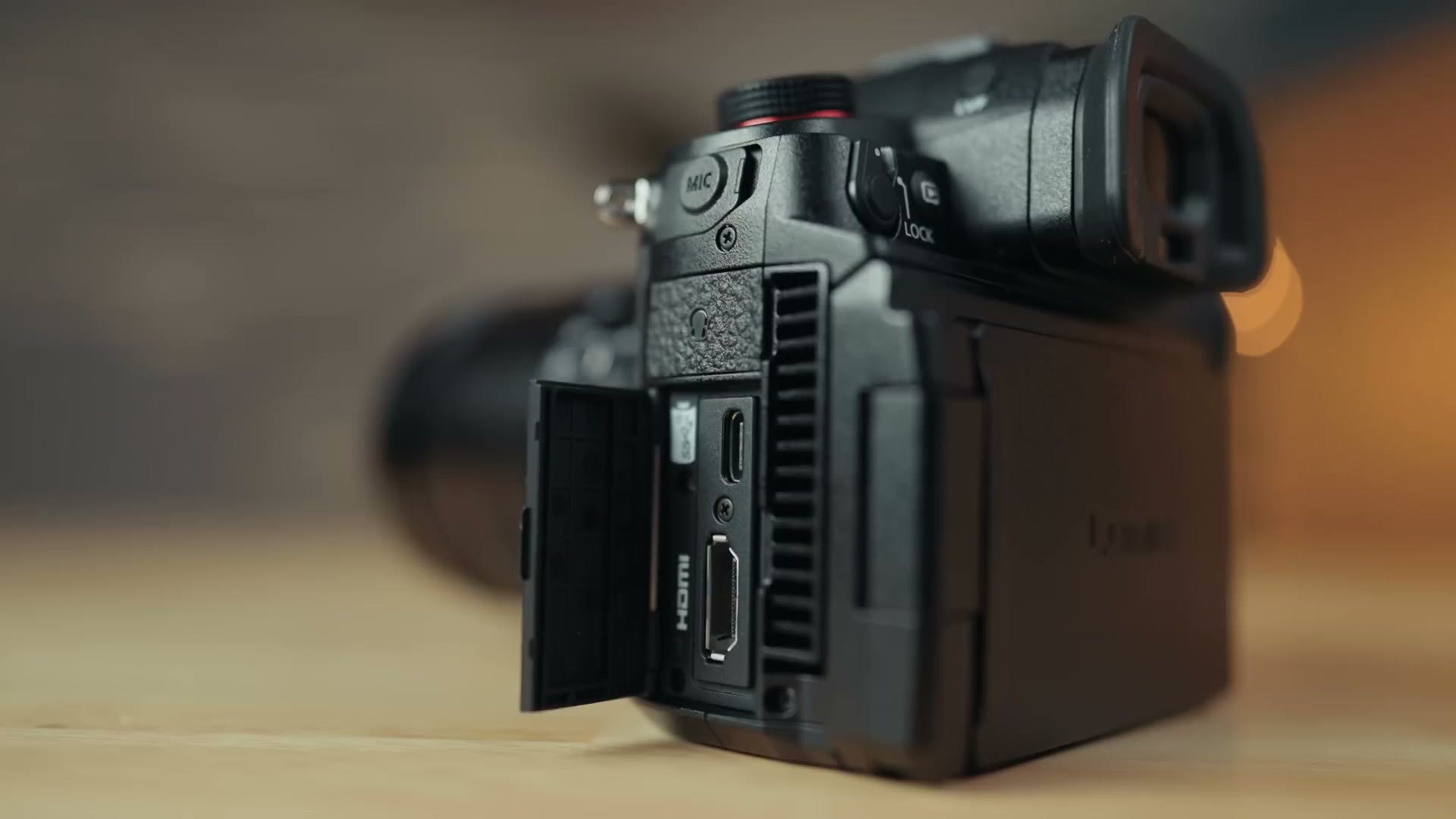 Port door open on the Panasonic GH7 showing the USB-C and full size HDMI ports