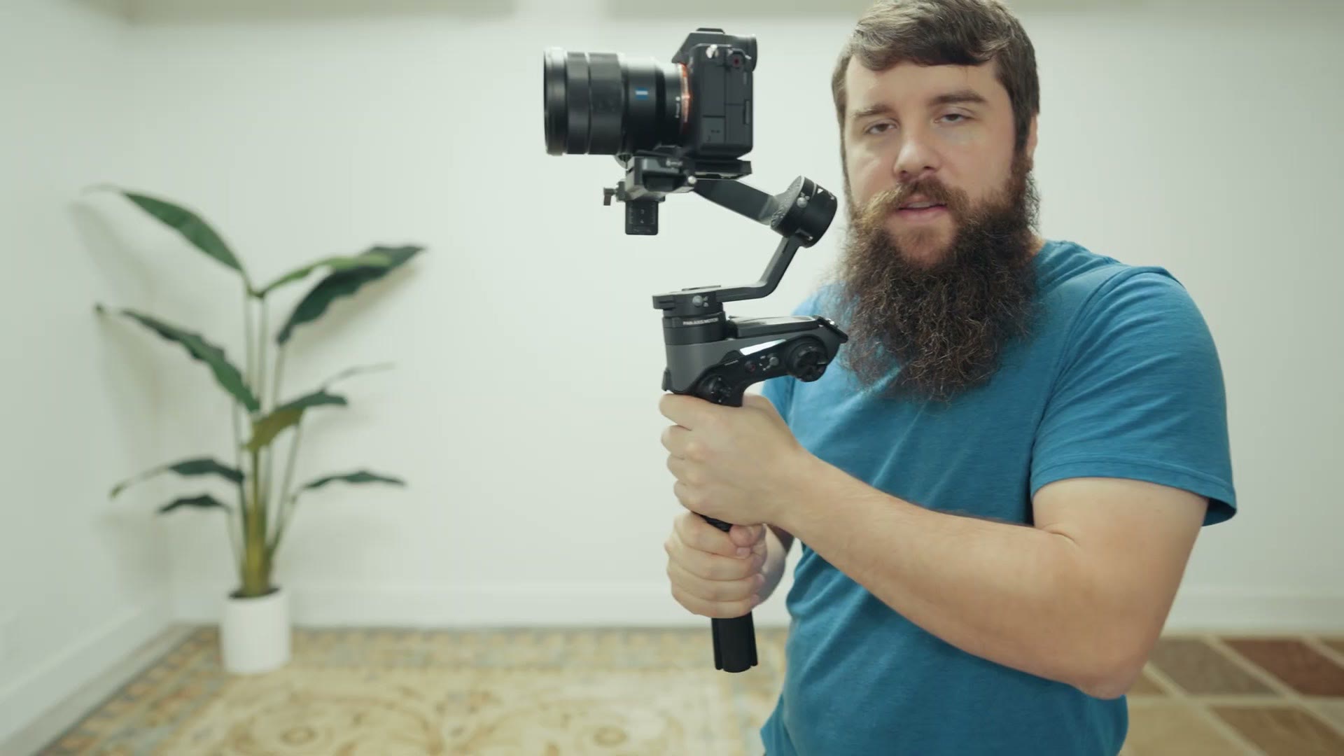 Holding a gimbal out in front with arms fully extended