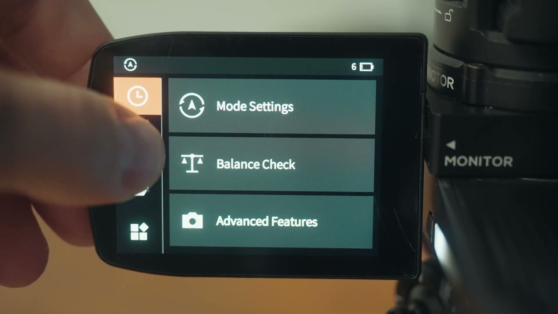 Gimbal touchscreen showing mode settings, balance check and advanced features