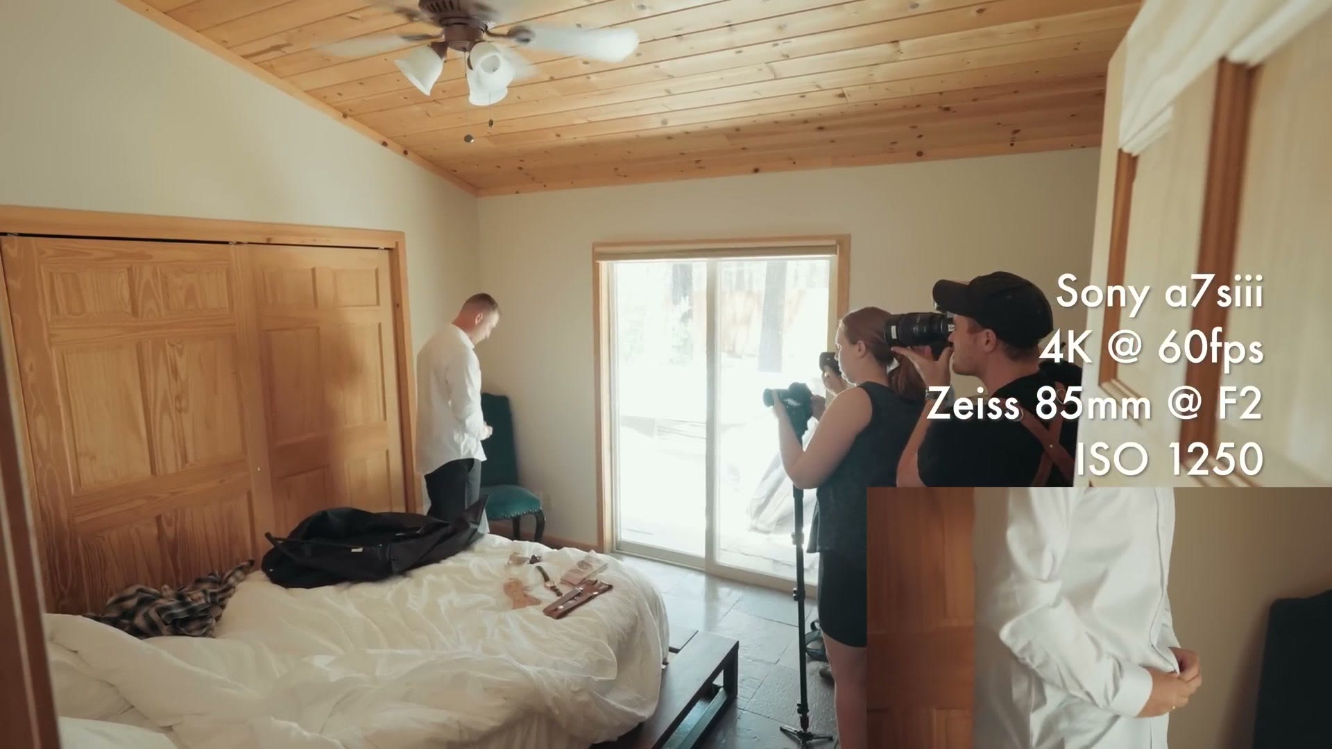 Groom prep filmed by the window light in the cabin