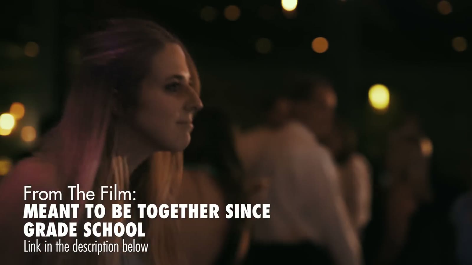 Woman with pink-streaked hair looking aside on a dim dance floor, captioned 'From The Film: Meant To Be Together Since Grade School'