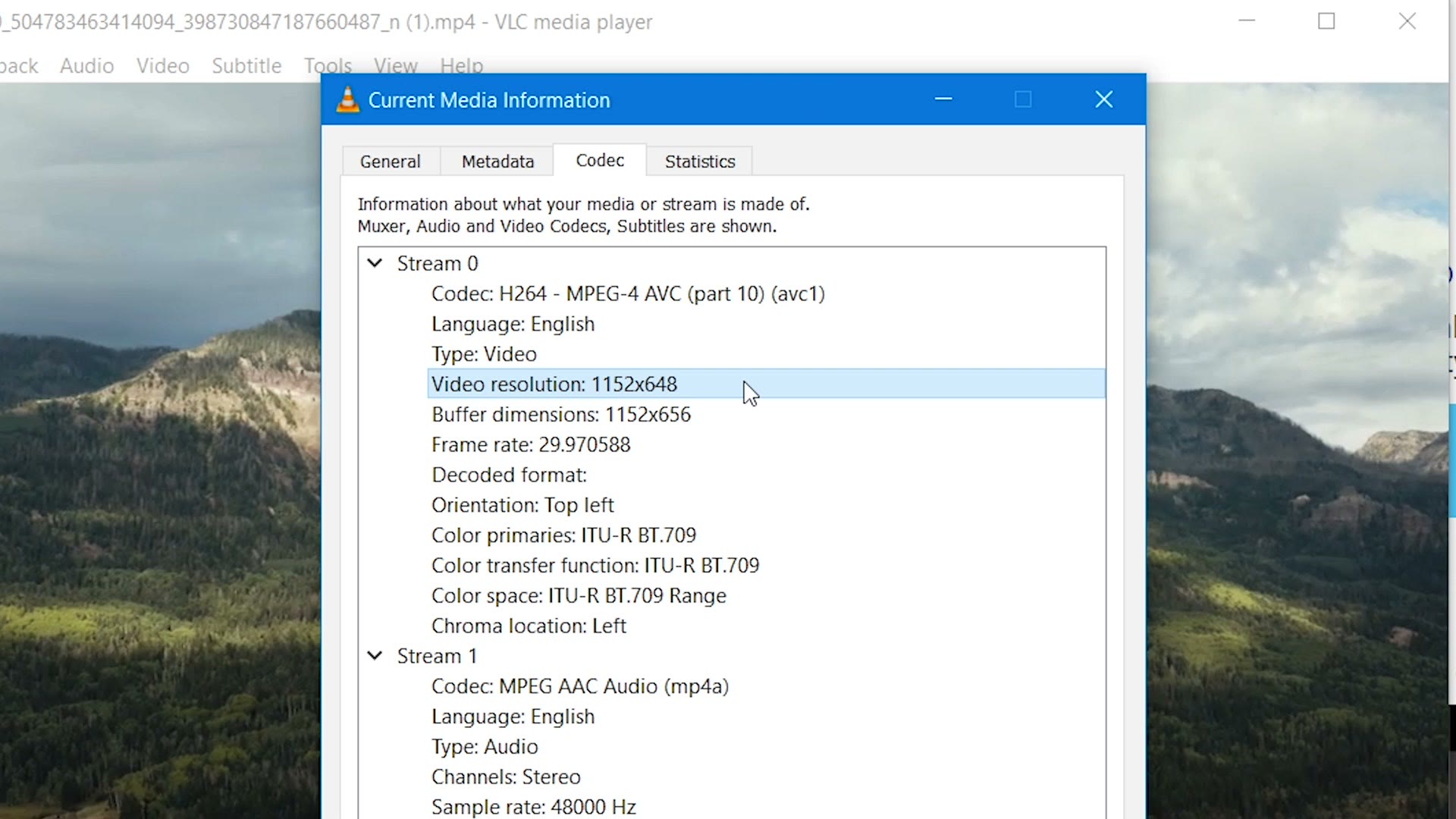 VLC media player's Current Media Information window showing a downloaded IGTV file at a video resolution of 1152x648, H264, 29.97 frames per second