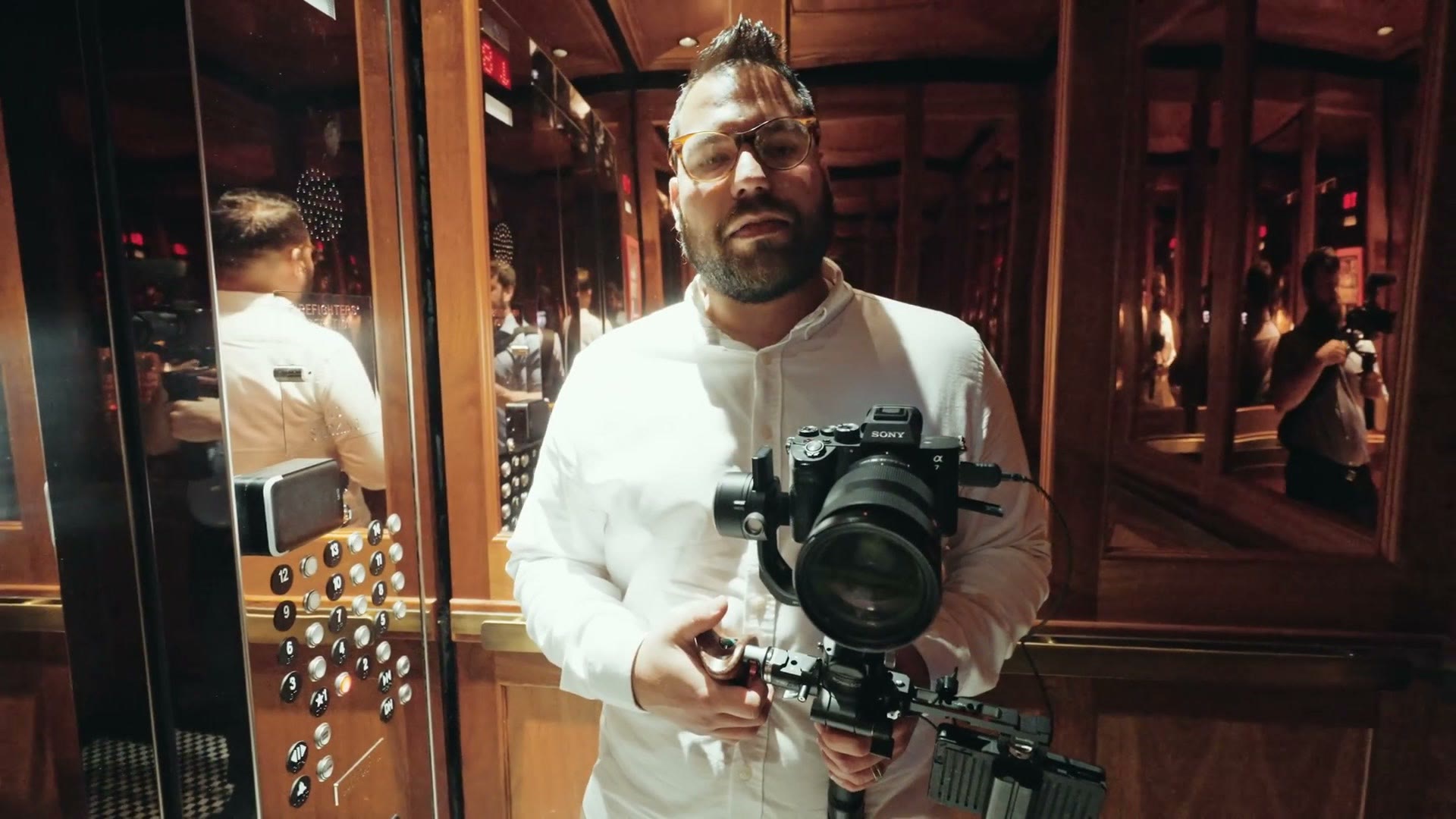Caleb from KEJ Productions filming at a wedding rehearsal dinner