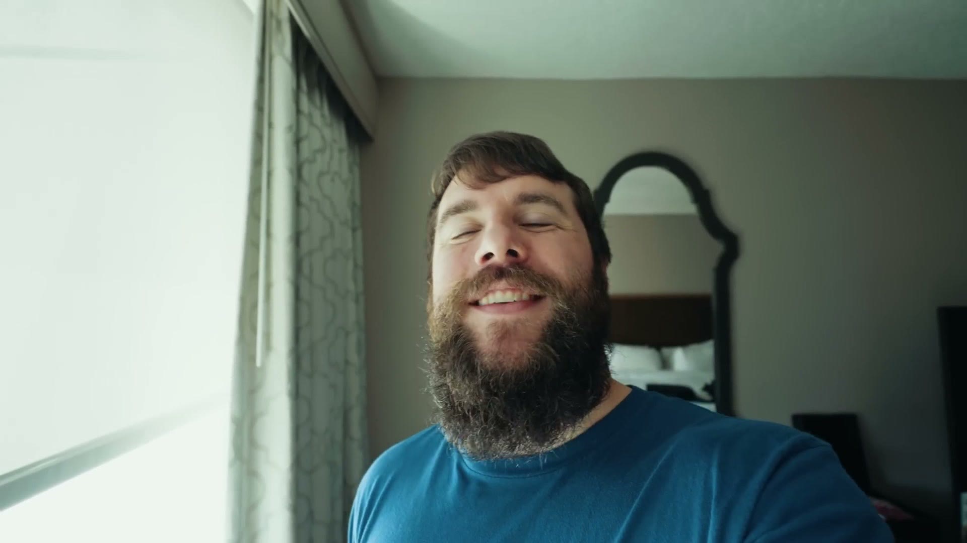 Matt Johnson in a hotel room introducing the behind the scenes video