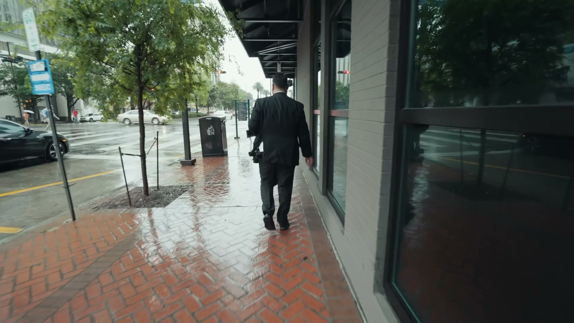 Pouring rain on a New Orleans street during the wedding day