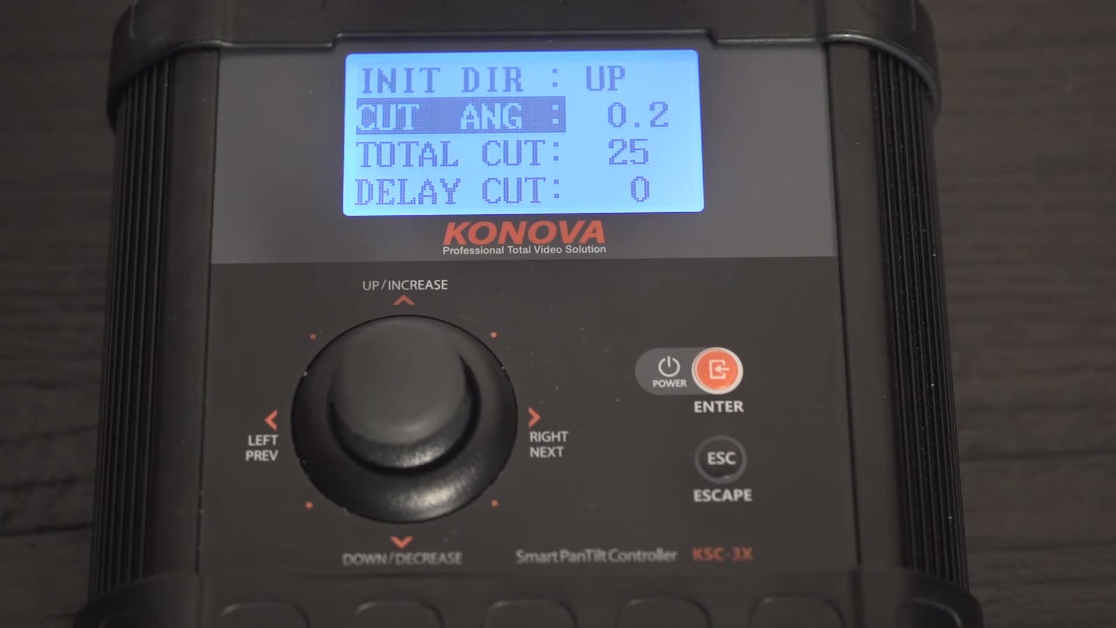 Konova controller screen reading INIT DIR: UP, CUT ANG: 0.2 highlighted, TOTAL CUT: 25, DELAY CUT: 0