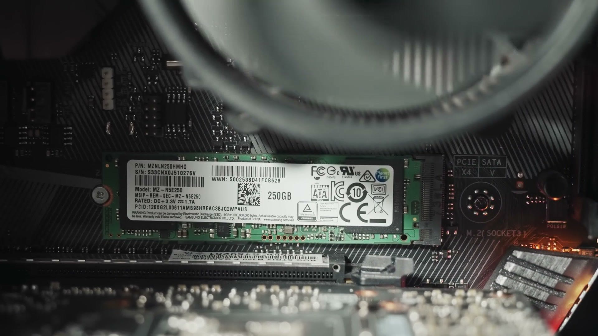 Samsung 970 EVO 250GB M.2 SSD installed in the motherboard's M.2 slot near the PCIe and SATA labels