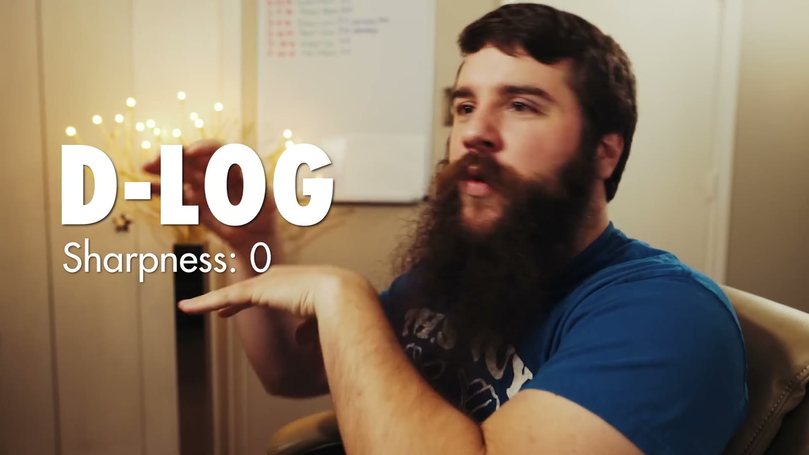 Matt gesturing to on screen text reading D-LOG, Sharpness 0