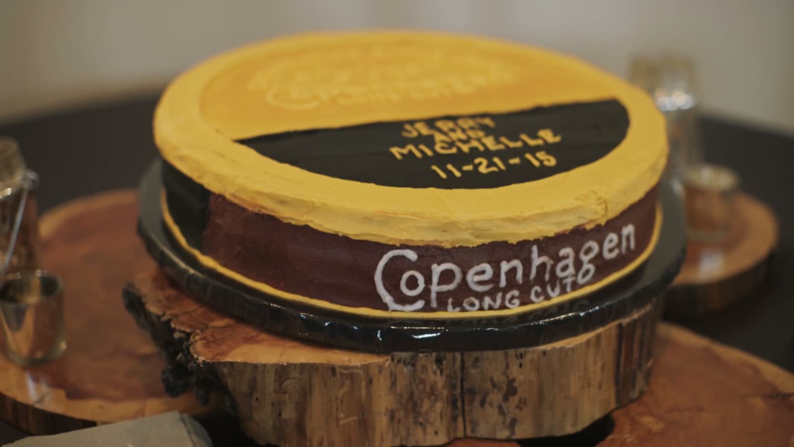 Round groom's cake styled like a Copenhagen Long Cut tin, reading Jerry Michelle 11-21-15
