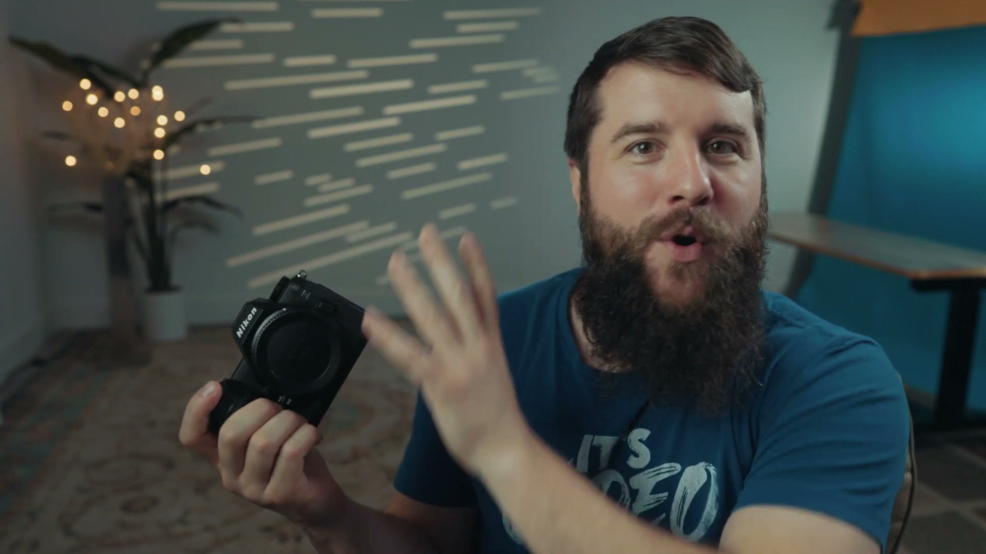 Matt Johnson holding a Nikon Z6 III mirrorless camera