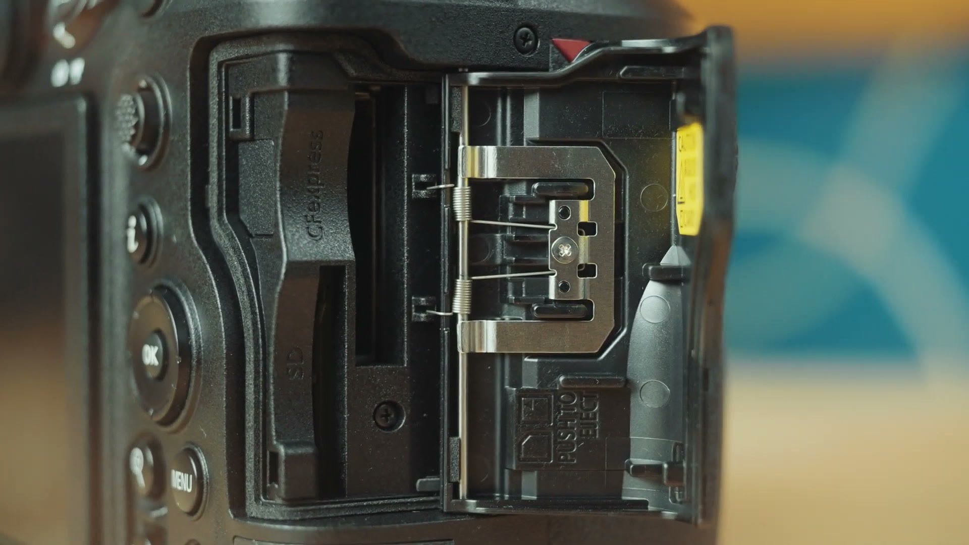 Nikon Z8 memory card door open showing one CFexpress Type B slot and one SD card slot