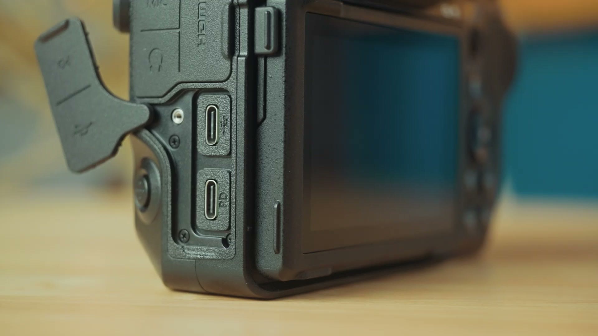 Close up of the Nikon Z8 side ports showing full size HDMI and two USB-C ports