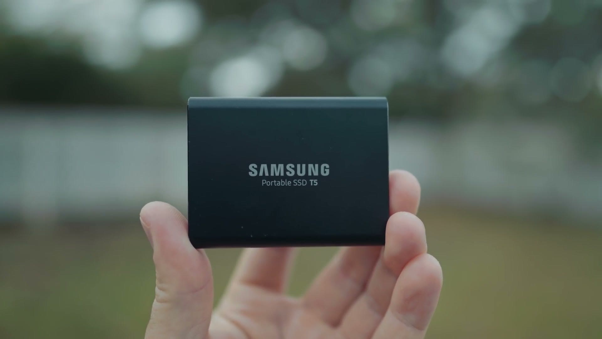 A portable SSD held in hand