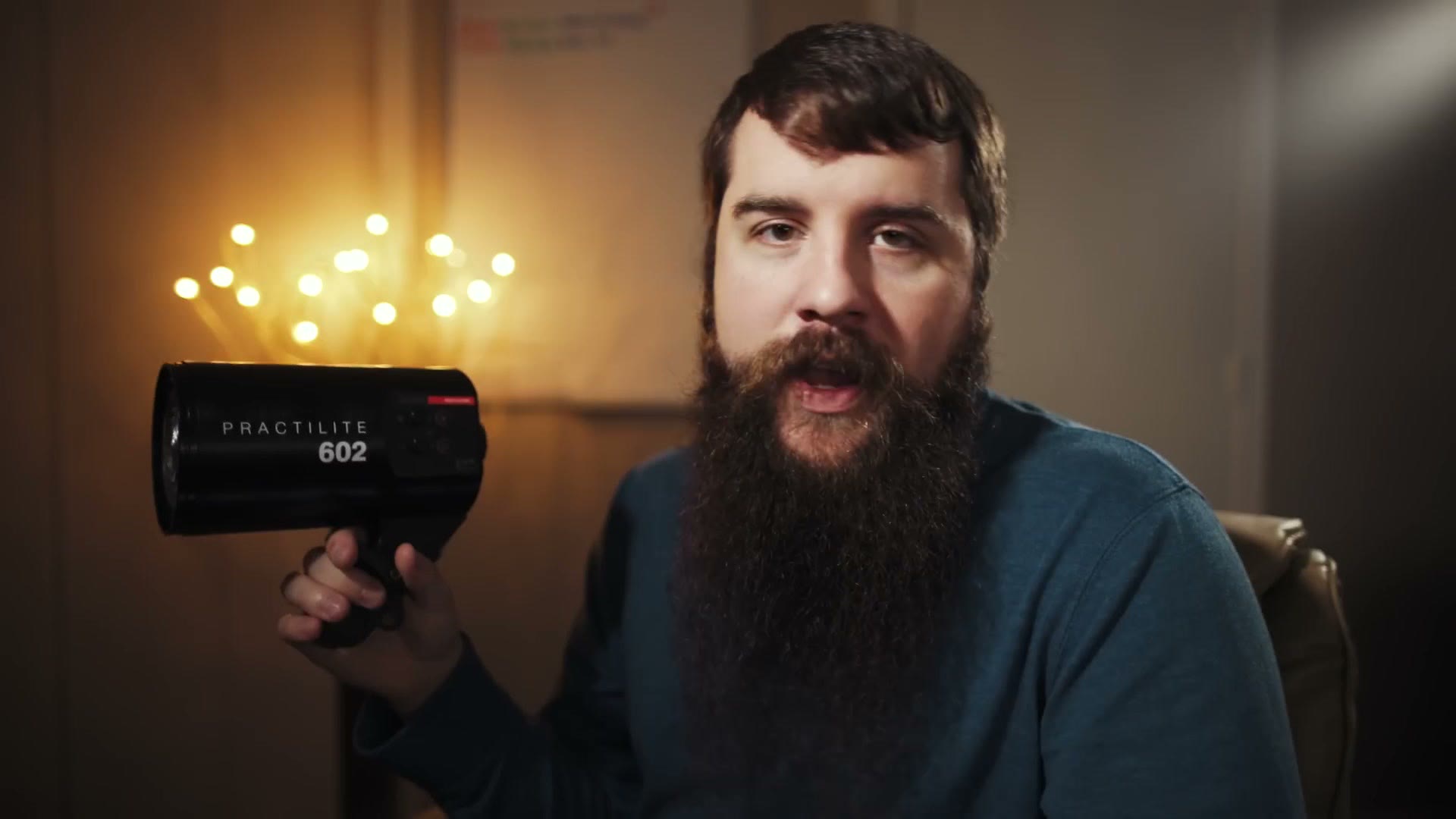 Matt holding the black Kinotehnik Practilite 602 LED fresnel spotlight by its handle