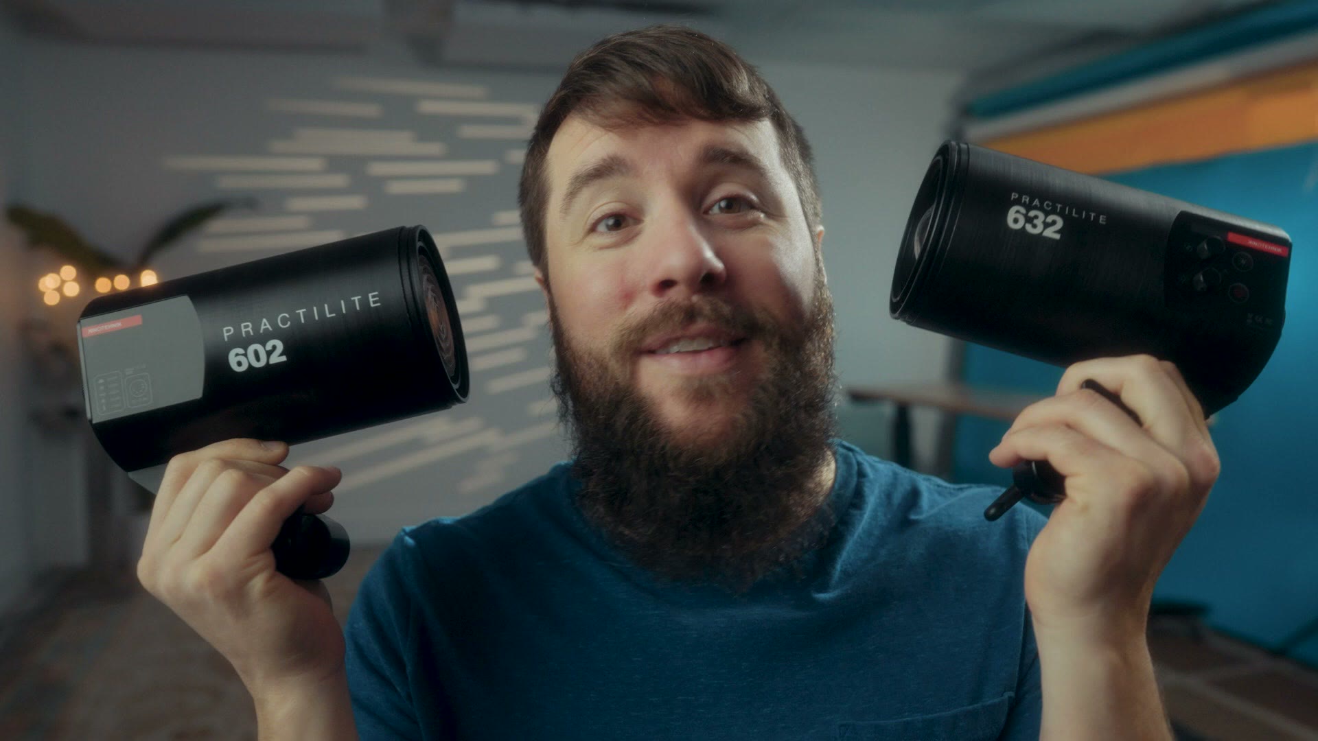 Matt Johnson holding the Kinotehnik Practilite 602 in one hand and the 632 in the other