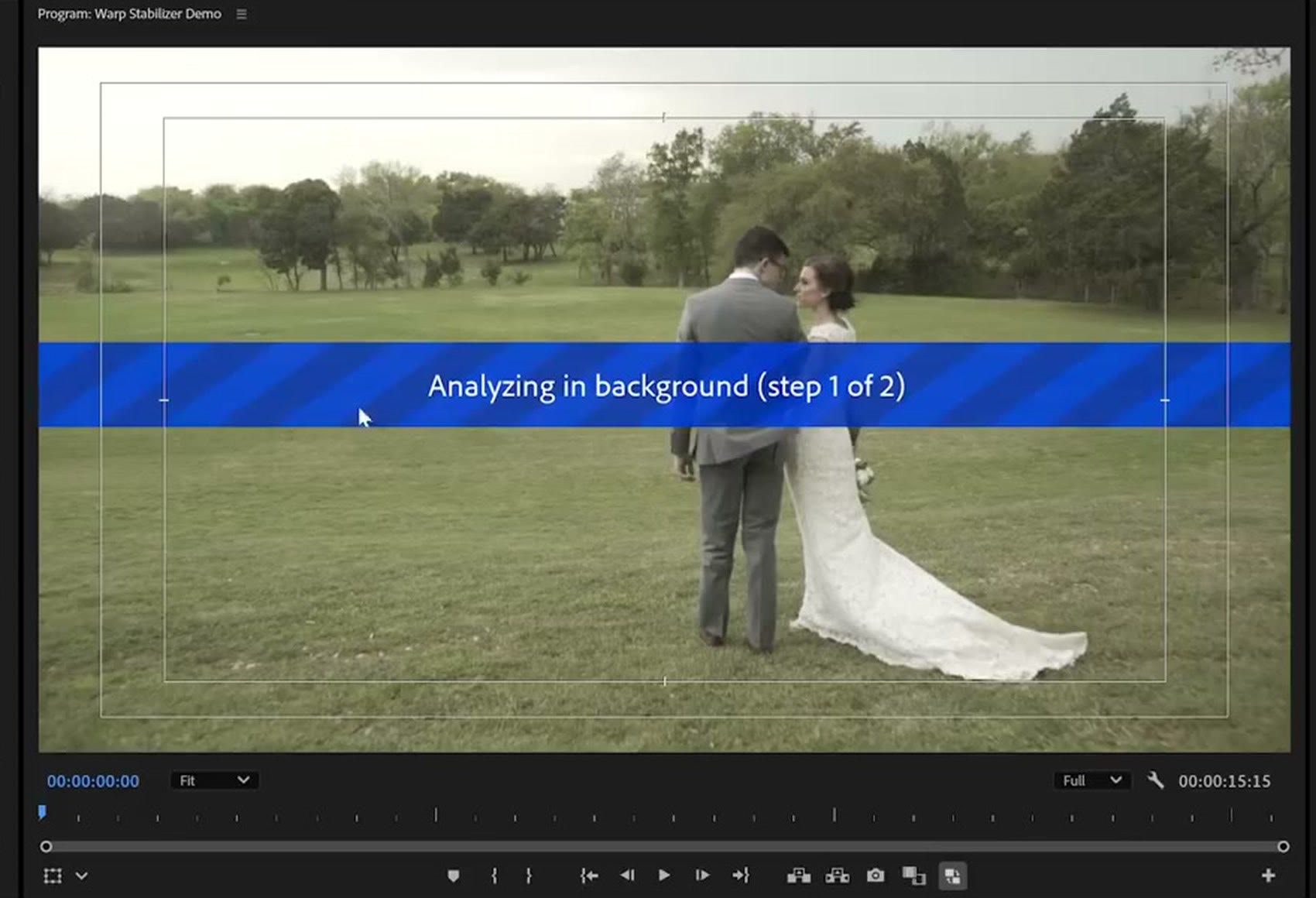 The Premiere Pro program monitor showing a blue banner across a wedding clip reading Analyzing in background, step 1 of 2