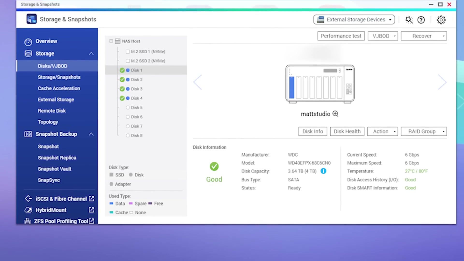 The QNAP Storage and Snapshots screen showing four healthy 4TB drives with temperature and SMART information
