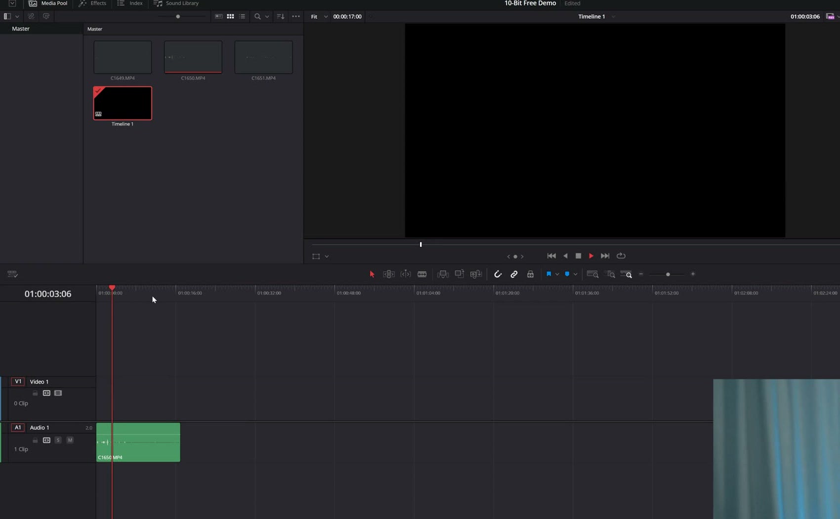 DaVinci Resolve showing a black viewer with a 10-bit clip on the timeline