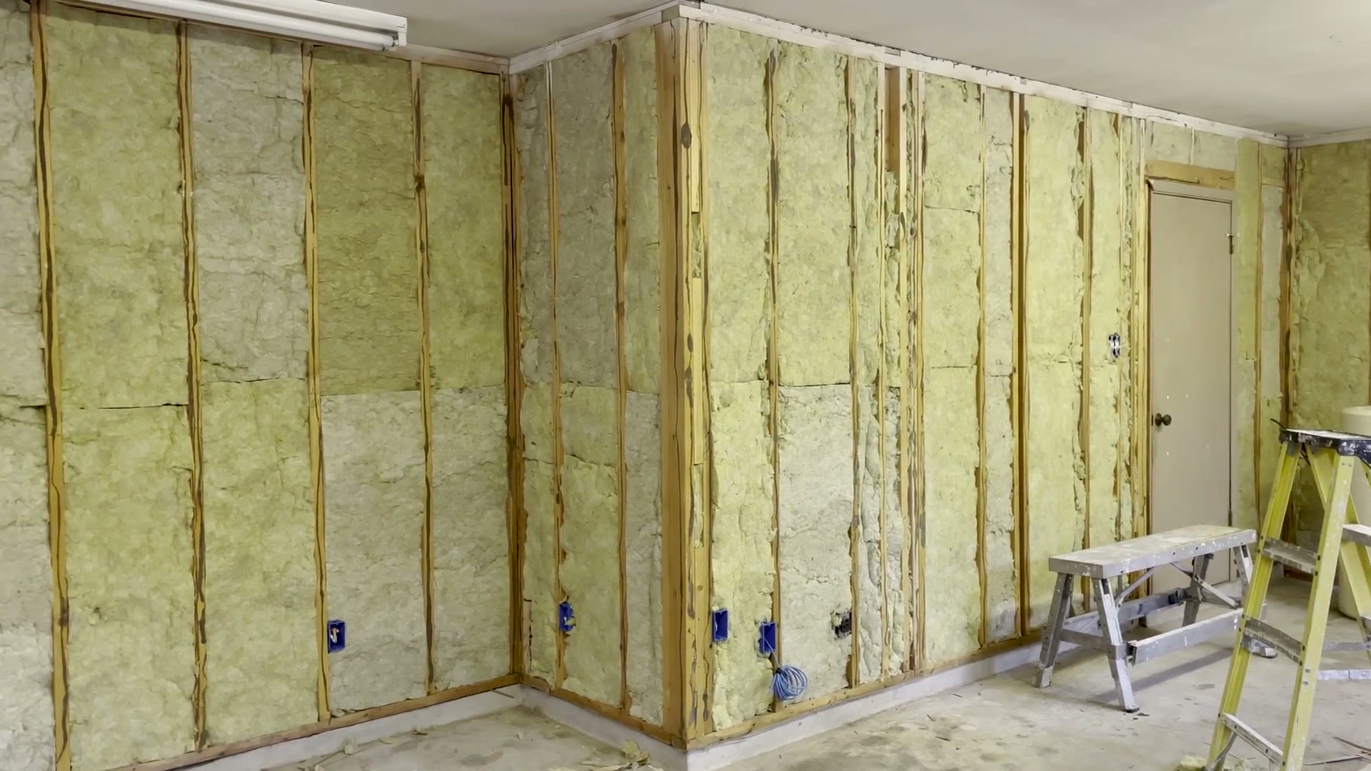 Rockwool insulation installed between the wall studs