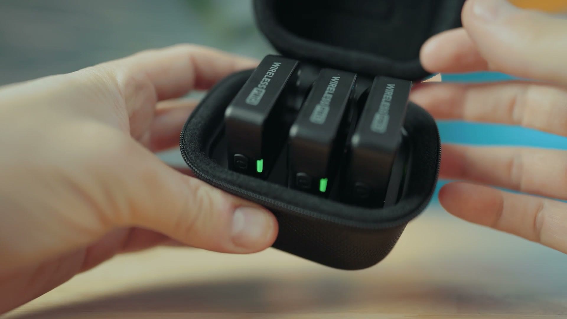 Rode Wireless PRO charging case open with transmitters and receiver inside