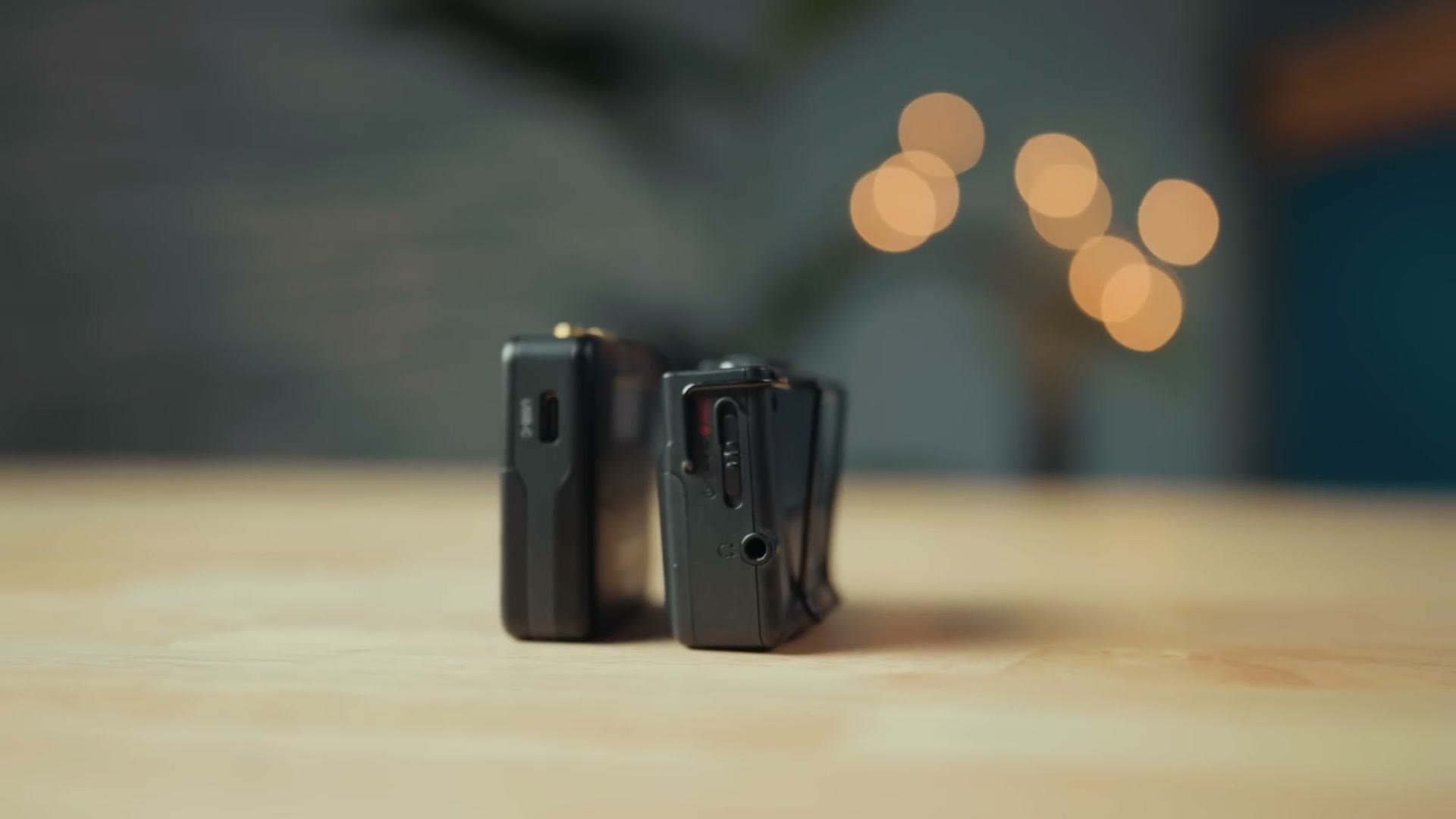Two Deity PR-2 recorders on a desk beside a belt clip