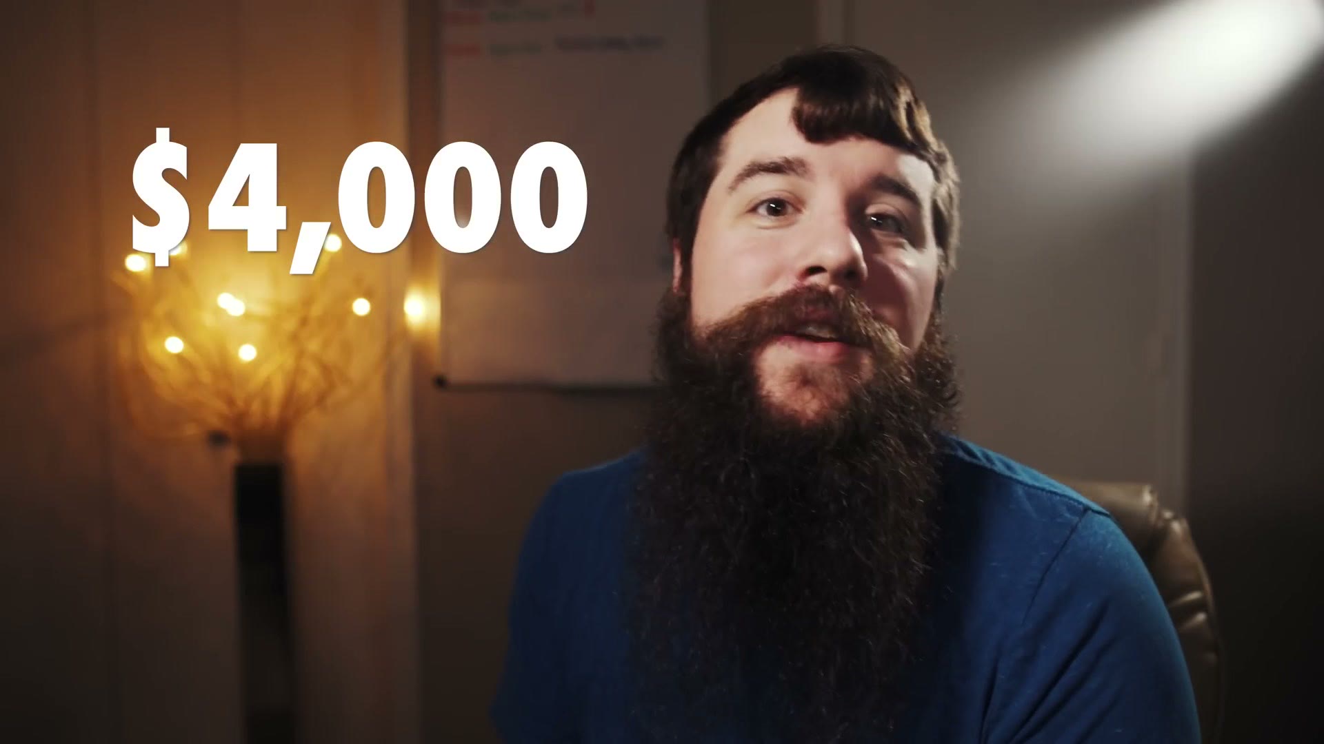 Matt on camera with the number $4,000 overlaid large across the frame